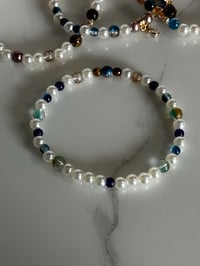 Image 6 of Starlight Shimmer Moon and Stars| Cream, Navy, and Gold  Tumbler Bracelet Stack