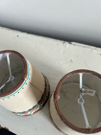 Image 5 of "The Edmund Brothers" - Matching Pair of Hand Painted Linen Lampshades, Candle-clip