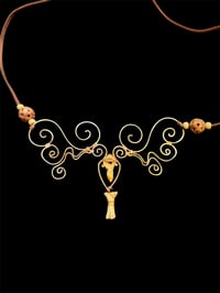 Image 2 of Bone earrings and necklace