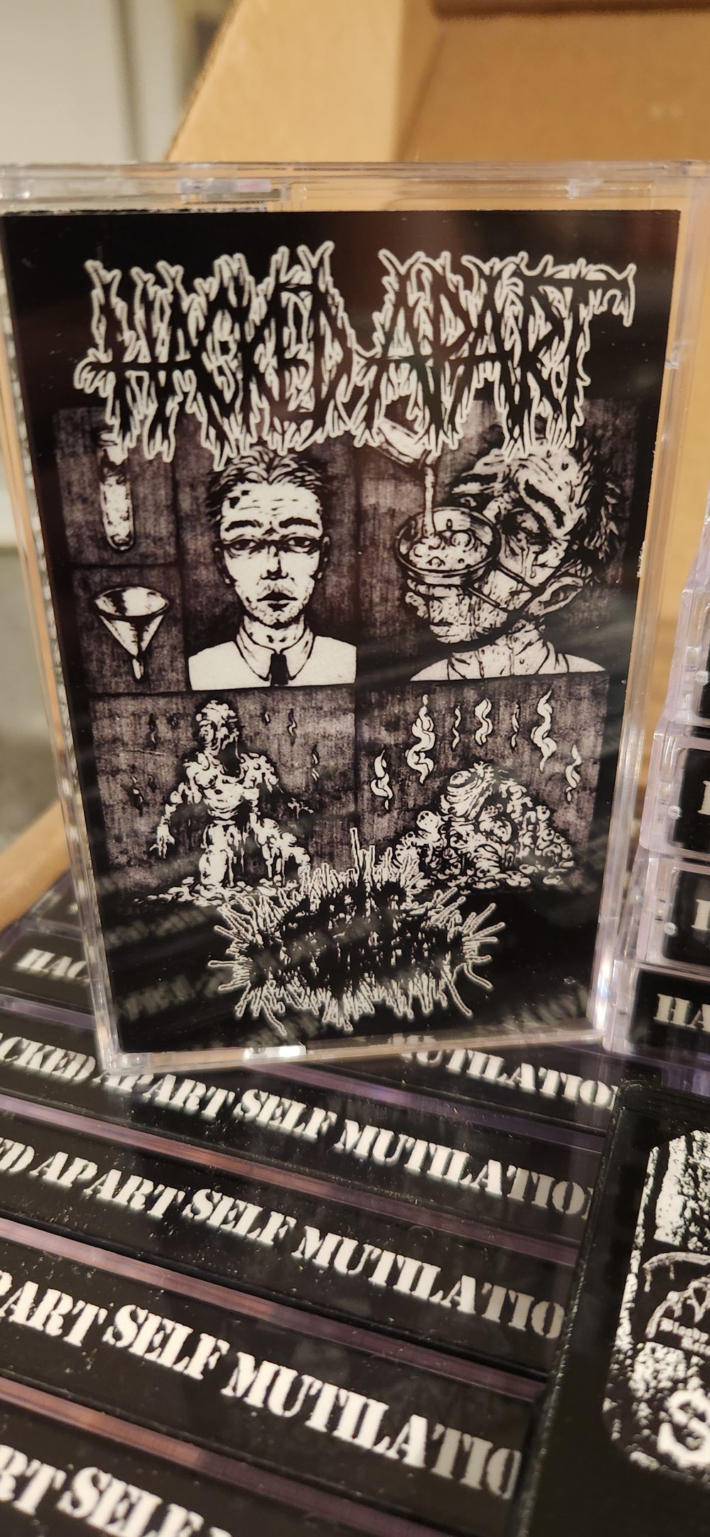 HACKED APART / SELF MUTILATION split Cassette (Scythe - 106)