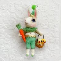 Image 1 of White Rabbit with Basket of Chicks and Carrot