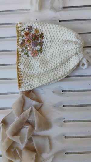 Image of Embroidered  off white bonnet