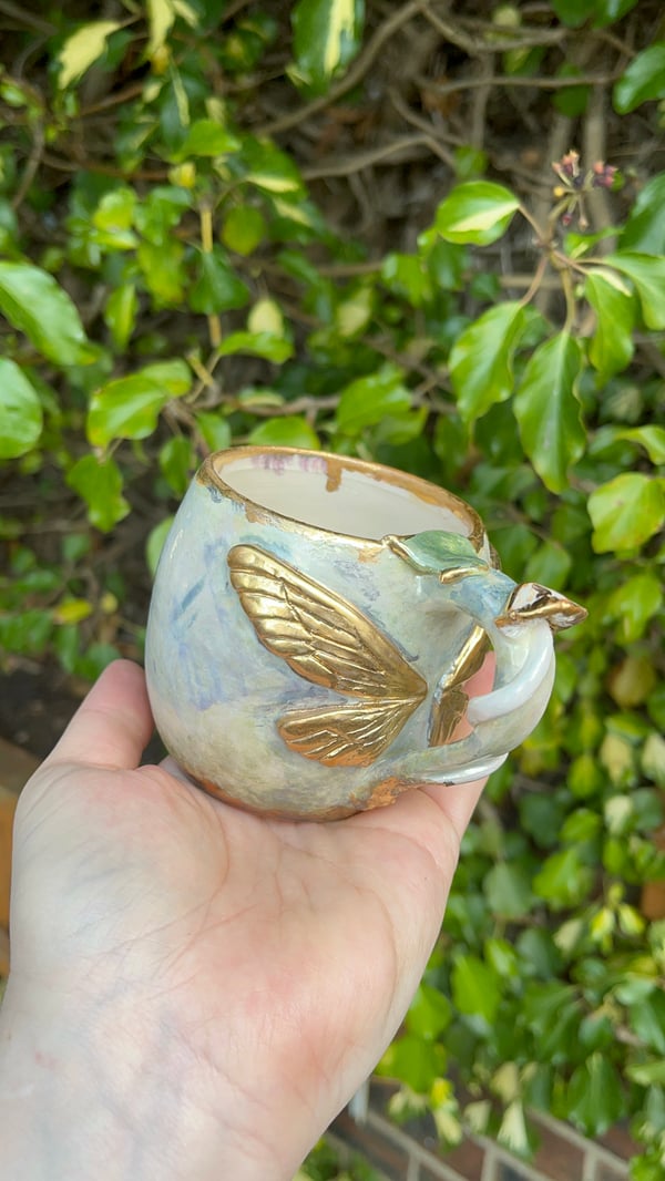 Image of Whimsical and enchanting gold faerie wing tea cup