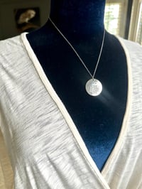 Image 6 of green sapphire pendant with handwritten quote