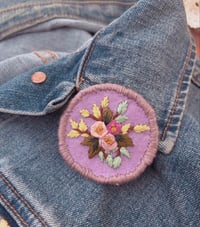 Image 1 of Hand embroidered florals on felt pin badge - Purple