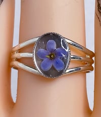 Image 1 of Forget Me Not Adjustable Ring Clear Resin Background