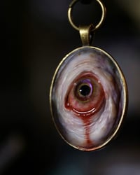 Image 5 of Color Shift Eye glow in the dark pendant OOAK