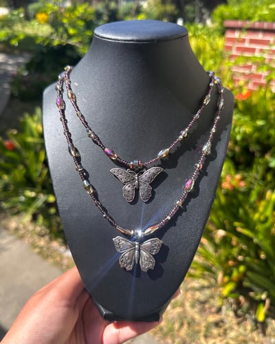 Image of aura butterfly necklaces