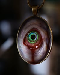 Image 7 of Color Shift Eye glow in the dark pendant OOAK