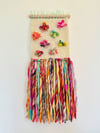 Rainbow popcorn. Woven wall hanging.