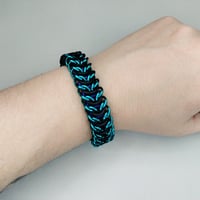 Image 4 of 2-in-1 Spooky Teal Reversible Elfbridge Stretch Bracelet