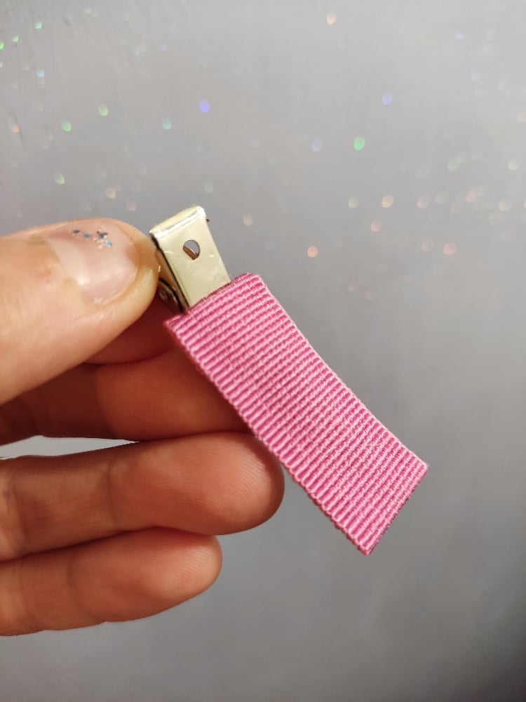 Image of Clip barrette lilla e rosa