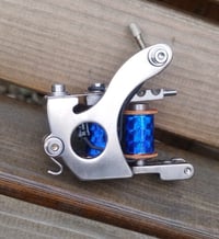 Image 1 of Supreme style shader / packer nickel plated 