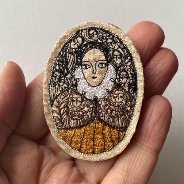 Image of Noble woman in brown cape - embroidery portrait brooch 