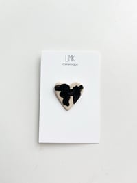 Broche cœur céramique noir et blanc