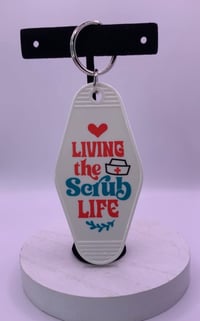 Image 1 of Scrub Life Motel Tag Keychain (Watch this Come to Life on Pinterest @wegotthebeads0435) Only 1 left