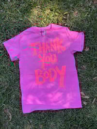 Image 1 of Gentle Pink T Shirt with Fluro Orange Peachy Text (small)
