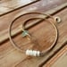 Image of Waterproof 7 tiny pukas choker necklace on hand braided sinew with locking seaglass clasp