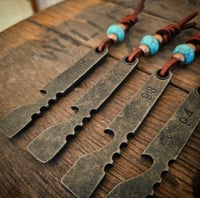 Image 1 of NUMBERED TRKC Bottle Opener/Pry Bar