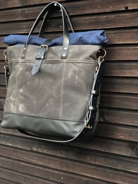 Image 5 of Waxed canvas roll to close top tote bag with luggage handle attachment leather handles and shoul