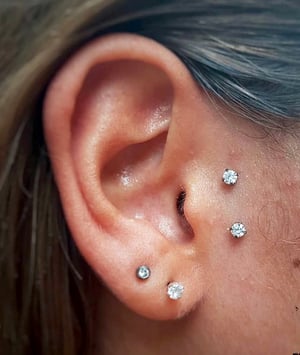 SURFACE TRAGUS PIERCING SERVICES