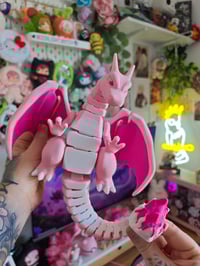 Image 1 of Charizard rosa XL