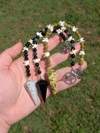 Image 1 of Snake Vertebrae Pendulums