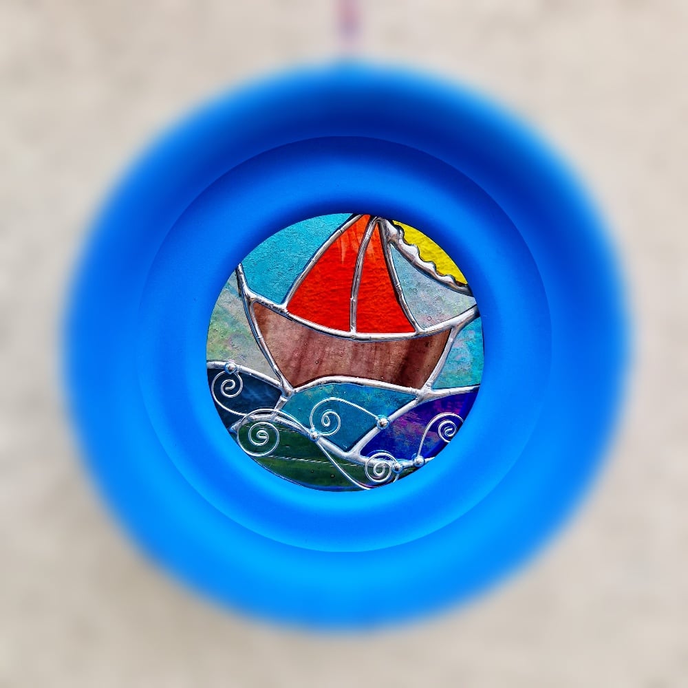 Image of Porthole Sailing Boat ⛵️ 
