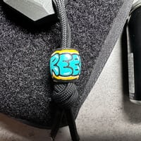 Image 2 of “REBEL” graffiti bead