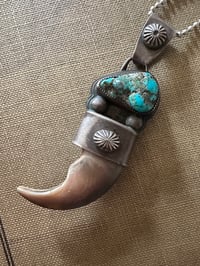 Image 1 of Sleeping Beauty Bear Claw Pendant 