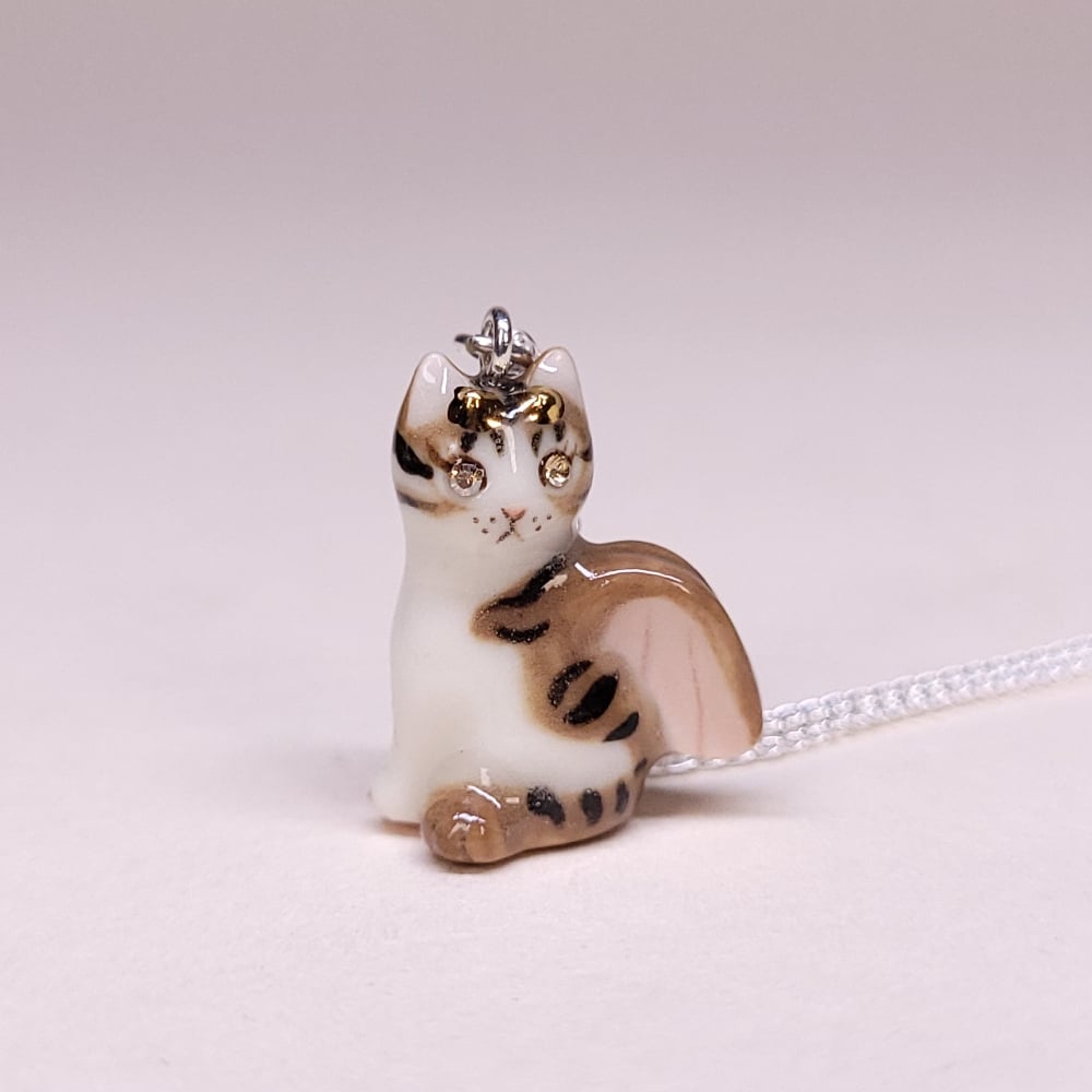 Image of Brown Tabby Porcelain & Sterling Silver Sitting Dragon Pendant