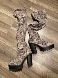 Snake print thigh high boots 