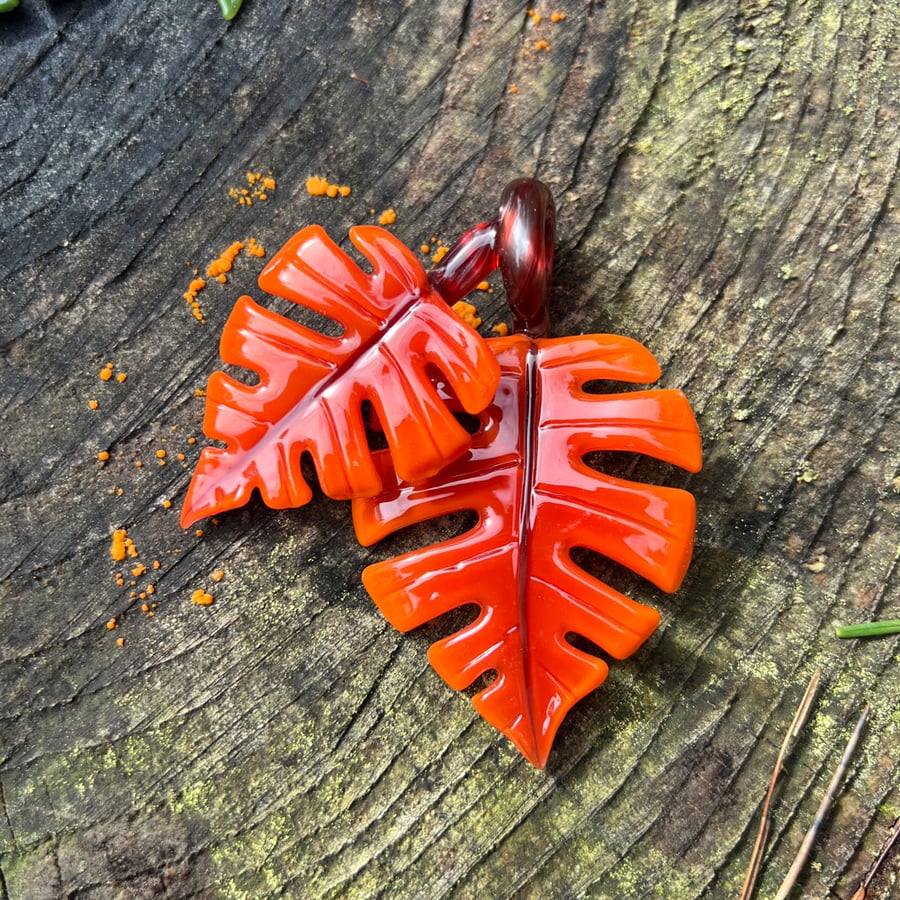 Image of Double Orange Sunburst Monstera Leaf Pendant