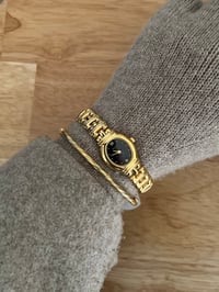 Image 1 of Vintage Gold 18K Gold Plated Pulsar By SEIKO oval black dial - New in Tag