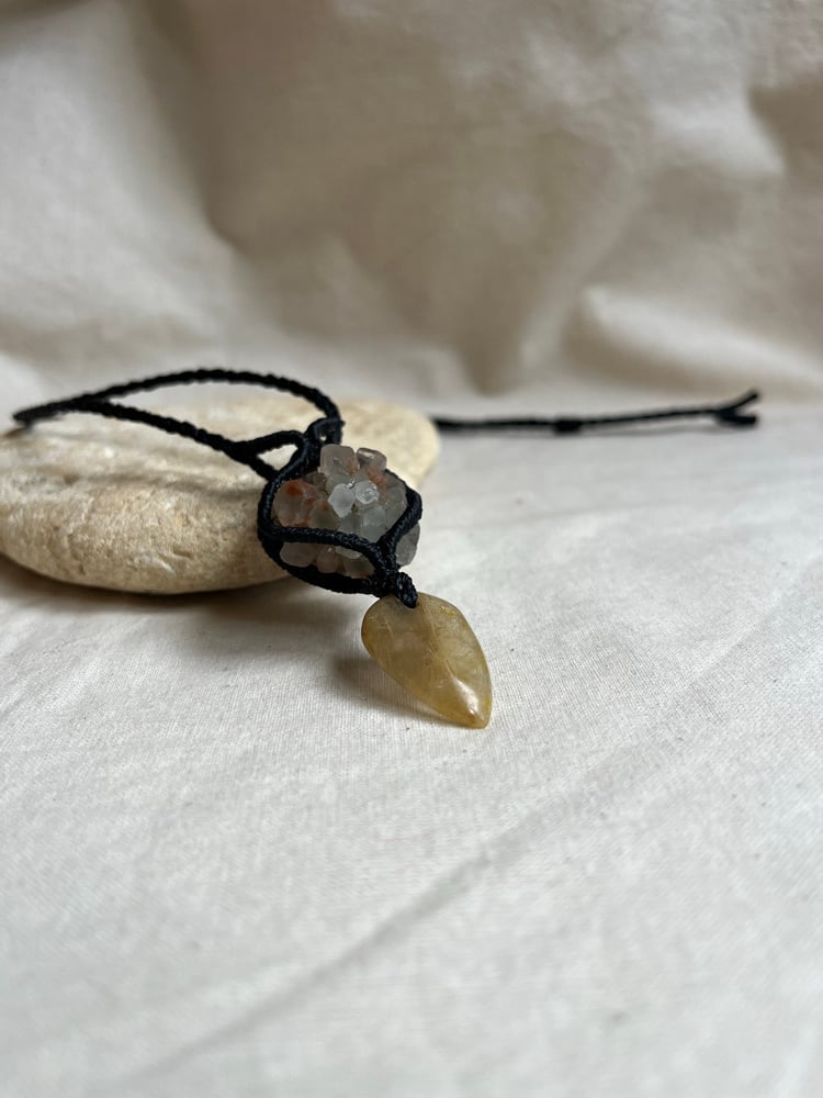 Image of Macrame pendant with aragonite and rutilated quartz