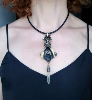 Bullet casings, pebbles and crystal necklace 