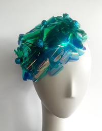 Image 1 of Iridescent teal flower button