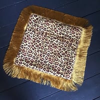 Image 7 of Leopard print fabric and red virgin of Guadalupe cushion cover with gold fringe or black fringe