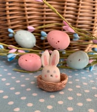 Image 5 of Ceramic Cute Pink Cheek Bunny in a basket.