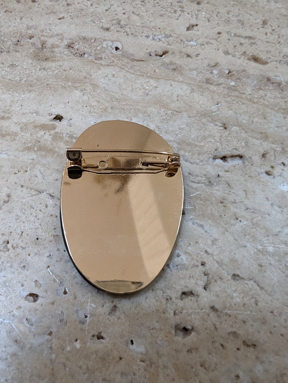 La broche visage