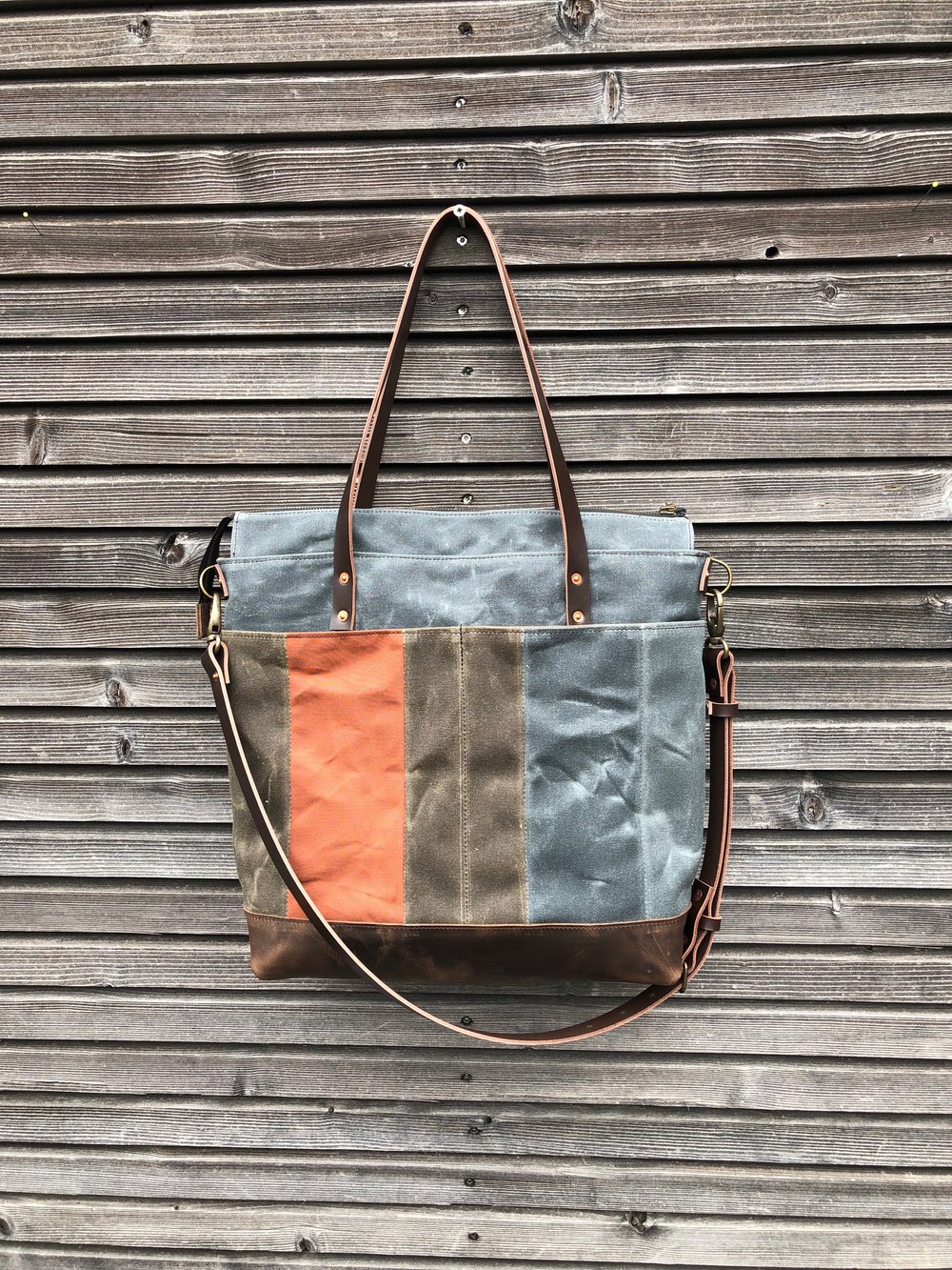 Image of Oversized tote bag in waxed canvas and leather with cross body strap COLLECTION UNISEX