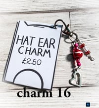 Image 16 of Ed’s hat ear charms