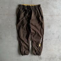 Image 1 of REEBOK SPELLOUT CUFFED TRACKSUIT PANTS