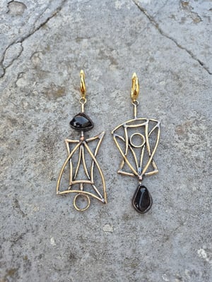 Asymmetrical brass earrings 