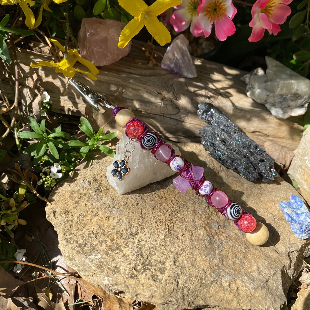 Image of violet cherry roach clip