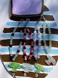 Image 4 of glass bead phone charms with trinket 