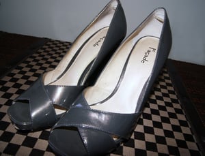 Image of Facade Patent Leather Pumps