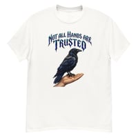 Image 3 of Trust Your Instincts Raven Unisex Graphic Tee – Gothic Raven & Hand Streetwear Design