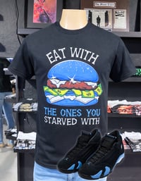 “Eat With The Ones You Straved With” T-shirt (Black/University Blue)