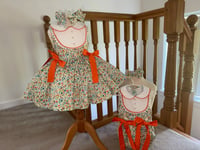 Orange flora romper 